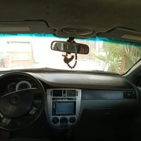 لبيع اوبتره موديل 2011حداديه كامله تخم تاير جديد  كير محرك جيد رقم بغد...