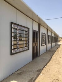 معمل حدادة السباع لعمل بيوت سندويج بنل وعمل السقائف والمحجرات ابواب وش...