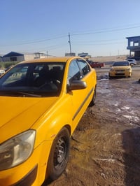 كيا ريو • ٢٠٠٩ • موصل الجانب الايمن