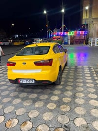 سياره كيه ريو 12 مضلع رقم بغداد سنويه وهزه جديده سياره بيه بس جاملغ ام...