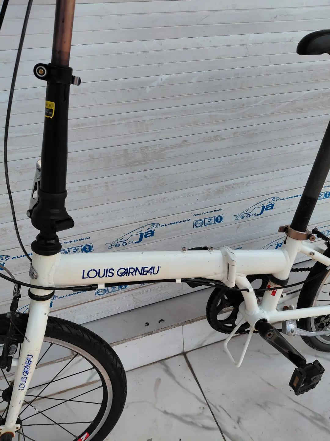 LOUIS GARNEAU FOLDING BIKE حجم 20 المنيوم بالكامل    ✈يوجد توصيل لجميع المحافضات ✈ كركوك مدخل سايدين حي الاسرى والمفقودين  معرض ابو شيفان ( *********** )
