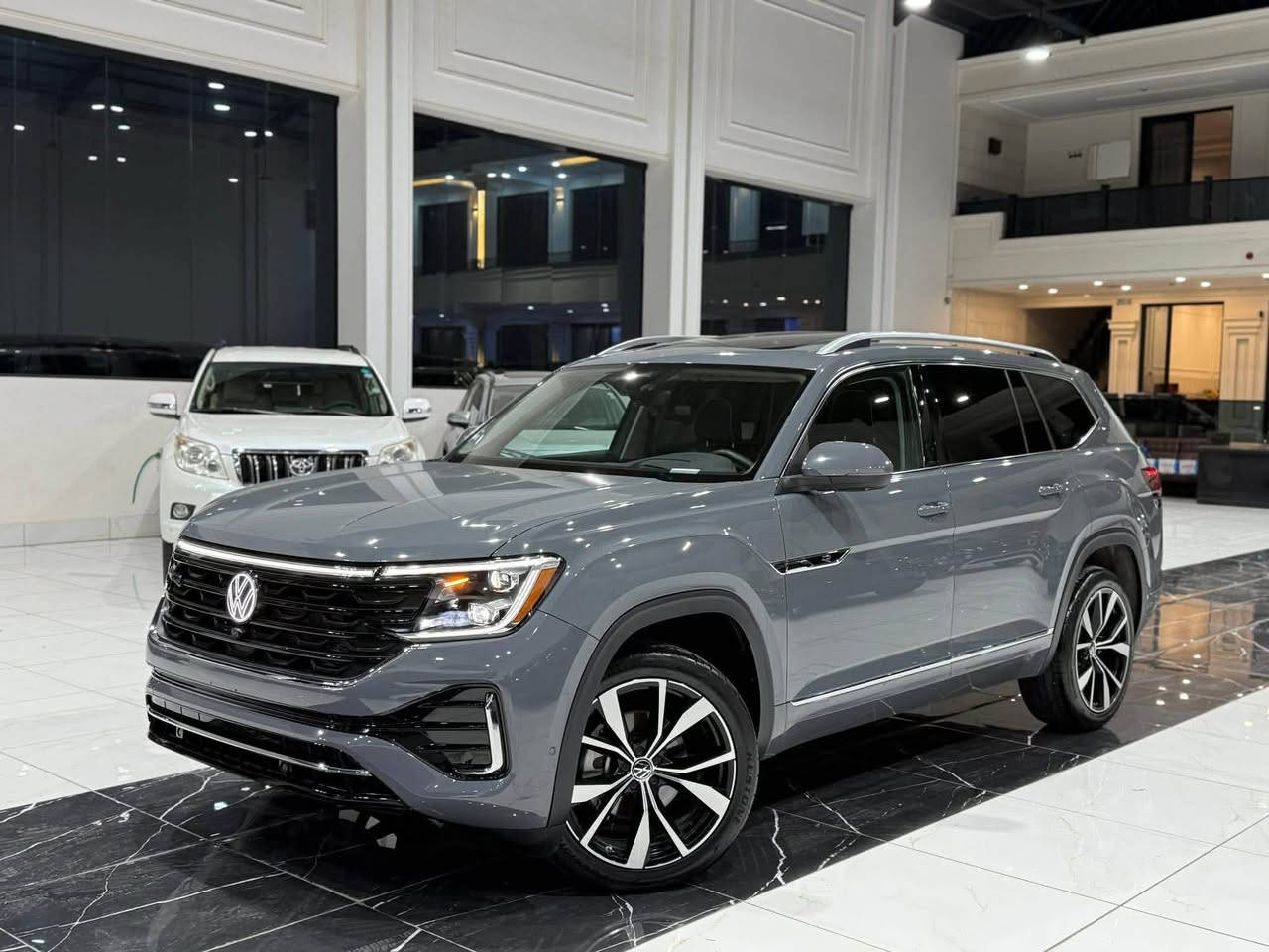 Volkswagen Atlas SEL Premium R-Line 2025
‎عداد المسافة : 11 الف مایل 
‎السیارة کلین تایتل بدون صبغ و تبدیل 
‎فاملي ٧ راکب 
‎لون سمنتي اعلی لون ب اطلس 

‎اعلی المواصفات  SEL premium Rline 1/1 :
‎سقف بانوراما
‎داتاشو 
‎بصمة تشغيل
‎بصمة أبواب
‎تشغيل عن بعد (Remote Start)
‎صندوق شفط كهربائي
‎رادار أمامي (تحديد مسار)
‎رادار جانبي (نقاط عمياء)
‎رادار خلفي (تحذير من الاصطدام)
‎كاميرات محيطية 360°
‎سستم سماعات FENDER
‎تحكم وضعيات القيادة Drive Modes 
‎اوتو بارك Auto Park
‎تبريد مركزي لمس
‎كشنات ميموري
‎كشنات جلد
‎کشن تدفئة و تبرید
‎هاند بريك بصمة
Android Auto 
Apple Car Play 
‎مانع انزلاق+ABS
‎شاشة كبيرة لمس
‎حساسات خلفية+ كاميرا 
‎تحكمات استيرن
‎اوتو ستارت Auto start 
‎اوتو ستوب Auto Stop 
‎وبقية المواصفات المعروفة
‎‏‎ 
‎مکان سیارة اربیل
‎‏‎سیارة بدون رقم تترقم شمالي 
‎‏‎‏‎للاتصال والاستفسار
‎☎️*********** اسیاسیل
‎کورك *********** ☎️
