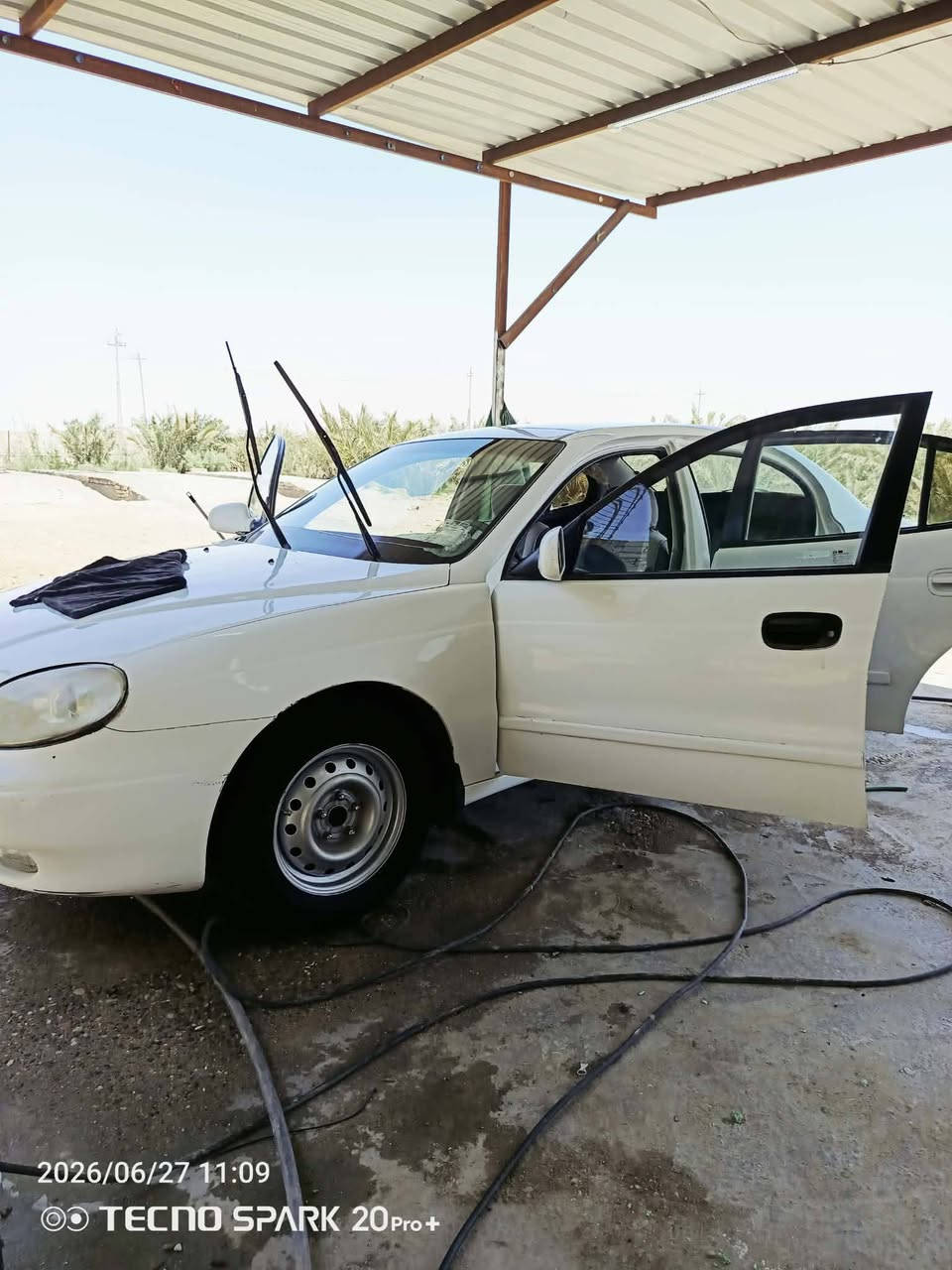 أسم السياره: دايو لكنزه🚗
الرقم:رقم بغداد✔️
وضع السياره:  مكينه جديده كير جديد صارلي 4 يام من شاده اوتوماتيك ✔️
مديل السياره: مديل 2000  سنويه ساقطه صارله سنه 🆕
السعر: 38  بيه مجال 💵
عنوان: ناصريه 🏙️

نص مكتوب في الصور:
- 2026/06/27 10:55 TECNO SPARK 20 Pro+
- 2026/06/27 11:10
- TECNO SPARK 20 Pro+
- 2026/06/27 11:09
- 2026/06/27 11:10 TECNO SPARK 20 Pro+
