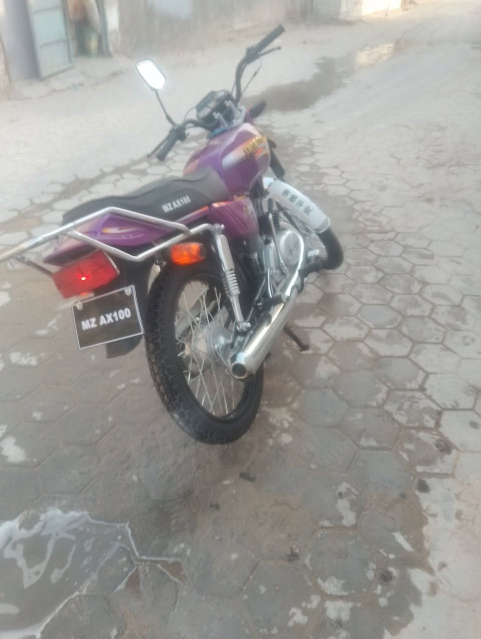 MZ AX100 • ١٠٠ • ٢٠٢٦