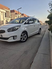 كارنز ٢٠١٤ • ٧ راكب • رقم بغداد إنكليزي