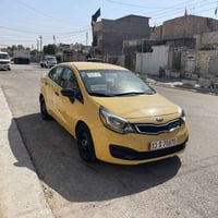كيا ريو 2014 مكينه 1600 ماشيه 125 سنويه جديده 2030 رقم دولي مصفره هيئه...
