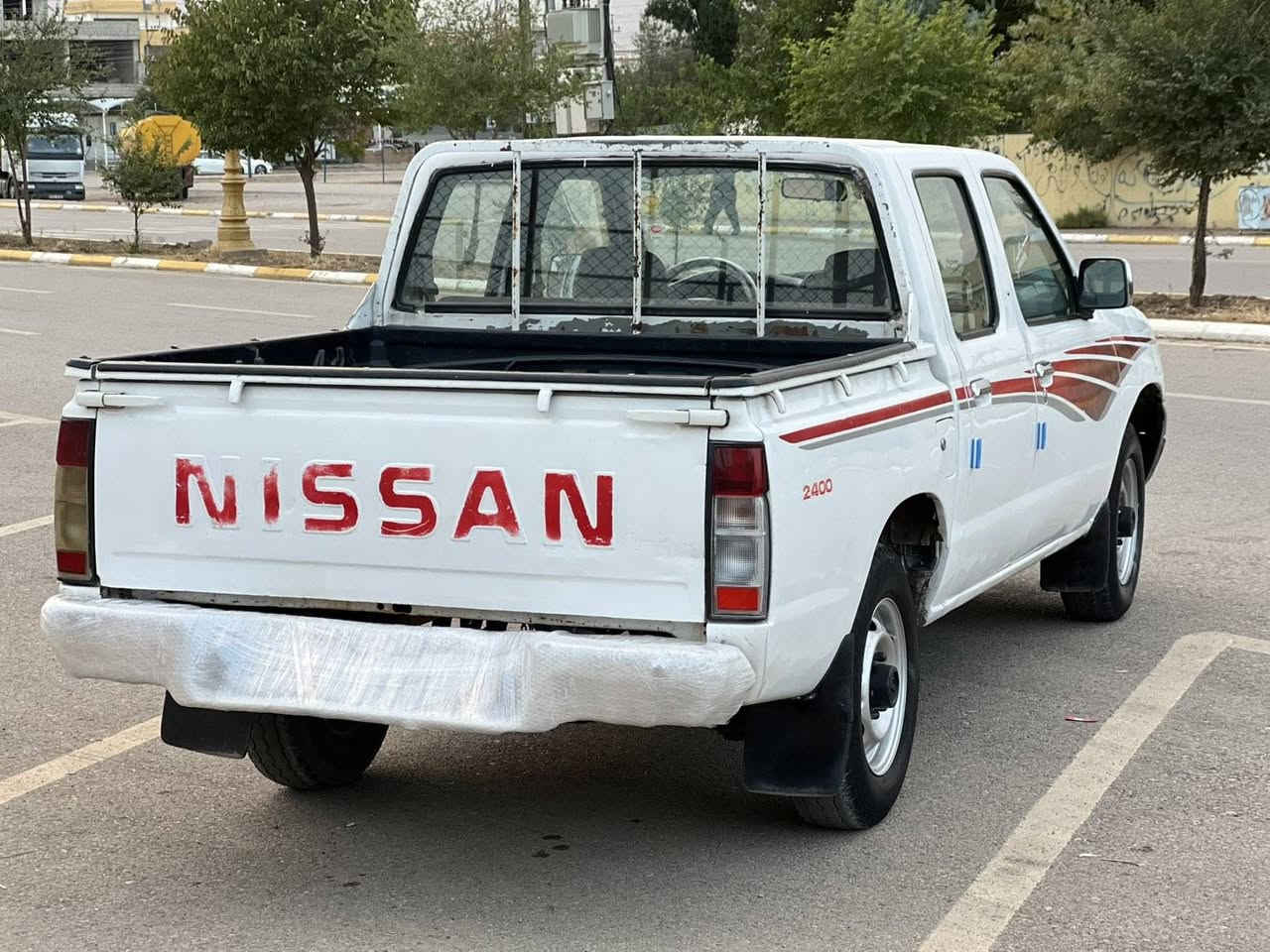 نيسان بيكاب • ٢٠٠٢ • قفل مركزي