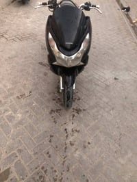 بسي اكس ياباني كفاله عامه مكينه ١٢٥  دراجه حلوه ونضيف اجي تاخذه من باب...