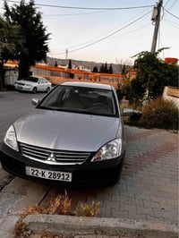 لانسەر 2011 گێڕ و مەکینە بەشەرت مەکینە بچوک ٤ پارچەی بۆیاخ سەیارەی ماڵ...