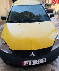 لانسر ٢٠١٠ • محرك ٢٠٠٠ • تبريد ثلج