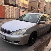 لانسر بومة • ٢٠١١ • محرك ٢٠٠٠