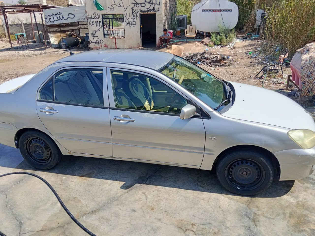 لانسر 10 مكفوله من الضربه والتبديل مكينه وكير خير من الله بيها جراد قليل السعر 75 وبيها مجال بسيط مكان السياره القادسيه الحمزه الشرقي  ***********
