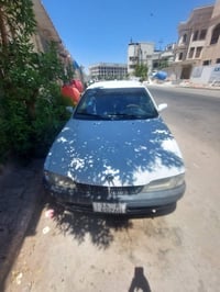 صني ٢٠٠٠ • مكينة كورولا • رقم انكليزي