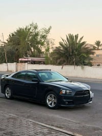 جارجر sxt 2012 قطعتين بدون دواخل لون السياره نيلي غامق  كير مكينه تبري...