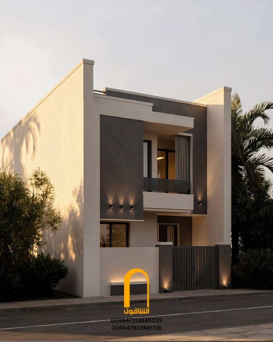 هيبة الكتل الداكنة وتناغم الظلال المسائية برؤية الشاقول

تصميم معماري لواجهة منزل سكني مودرن، يرتكز على التباين الجريء بين الكتل الرمادية المصمتة ونقاء الإطارات البيضاء

كتلة رئيسية بارزة بلون رمادي إسمنتي داكن تتوسط الطابق الأول، مزودة بإنارة جدارية موجهة تبرز ملمس السطح وتضفي عمقاً بصرياً قوياً.

سور خارجي مدمج يجمع بين مقعد خرساني مضاء مخفياً وبوابة حديدية رأسية بتصميم بسيط يعزز الطابع المعاصر للمدخل.

قوة العمارة تكمن في وضوح تضادها.. حين تصنع الكتل الصريحة حواراً متزناً بين الظل والنور يمنح الواجهة حضوراً لا يغيب

الشاقول للعمارة والبناء
بغداد - الكرادة / شارع 62

المهندس المعماري: علي عبد العالي | ***********
المهندس المدني: انور التوبي | ***********

#هندسة_معمارية #عمارة #تصميم_معماري #معماري #عمارة_حديثة

نص مكتوب في الصور:
- الشناقول
- 009647713840035
- 009647822881316
- المنتاقول 009647713840035 009647822881316