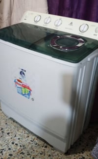 غسالة • ٣٠كليو • تغسل وتنشف بطانية