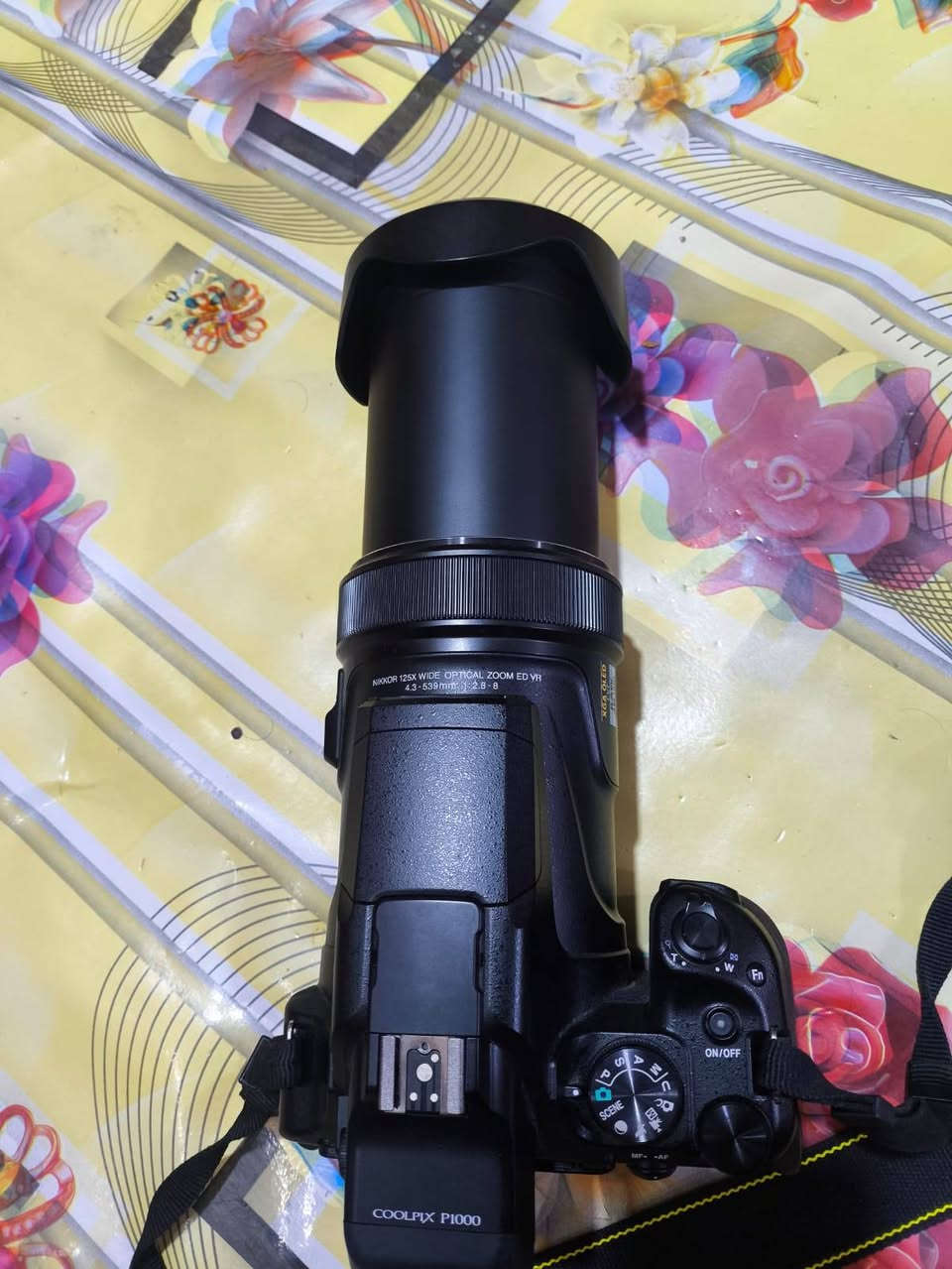 ي Nikon COOLPIX P1000دقة التصوير: 16 ميغابكسل.
زوم بصري: 125x (من 24mm إلى 3000mm مكافئ).
زوم رقمي: حتى 4x إضافي.
فتحة العدسة: f/2.8 – f/8.
مستشعر: CMOS قياس 1/2.3 إنش.
تصوير فيديو: 4K UHD.
شاشة متحركة قياس 3.2 إنش.
معين منظر إلكتروني OLED.
مثبت اهتزاز بصري (VR).
يدعم تصوير RAW.
يدعم Wi-Fi وBluetooth عبر SnapBridge.

مكلف بنشر   رقم صاحب الكامره

***********
