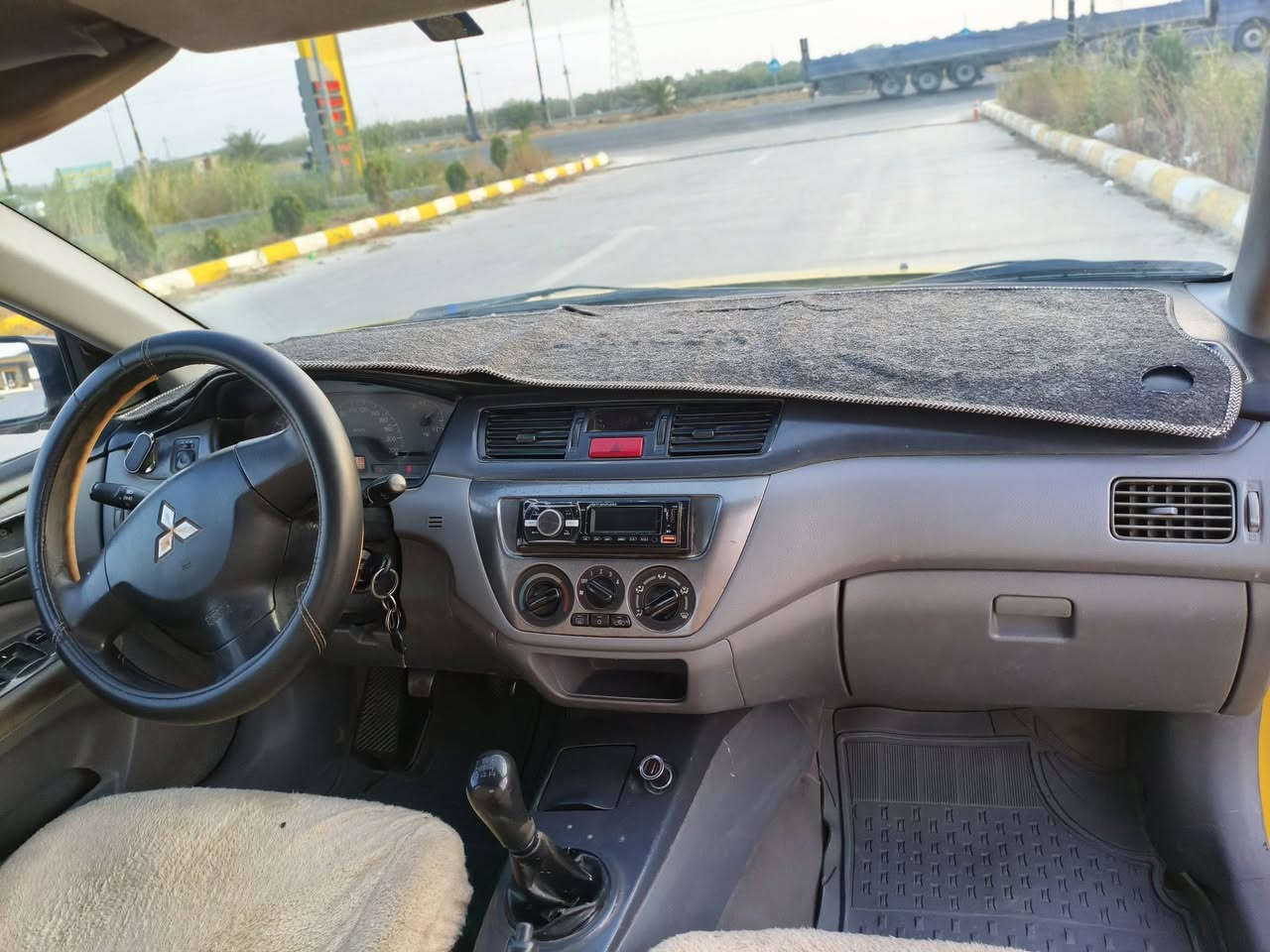 لانسر تاكسي • ٢٠١٠ • مكيف بارد وساخن