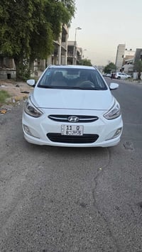 اكسنت موديل ٢٠١٦ لون ابيض خليجي رقم بغداد  مشروع وطني شاشة وفتحت سقف ا...