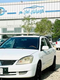 لانسر 2011 • اوتوماتيك • كەلار