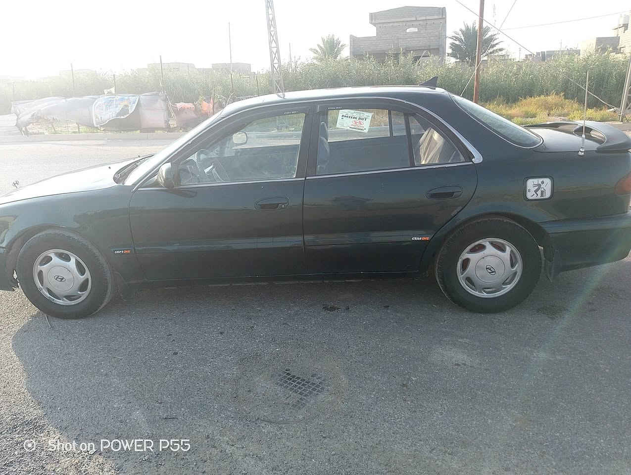 سوناتا تو موديل 1995مكينه وكير واكسل بجيس ترايها وين متريد مصبوغة عام مابيهه أي نقص سياره خيرمن الله ***********

نص مكتوب في الصور:
- Shot on POWER P55
