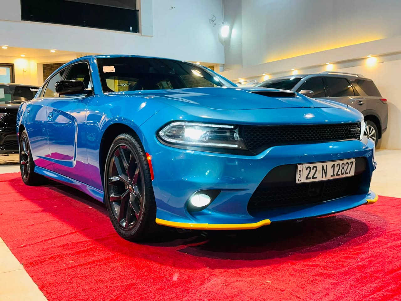 لطلب السعر علق بالرقم 1

2023 DODGE CHARGER GT PLUS 

3.6L V6 - GCC - LAST CALL ￼

مرقمة اربيل ✅

بطاقة بانزين✅

خليجي وكالة هارلم ✅❤️‍🔥

المحرك والاداء:
•  المحرك: 3.6 لتر V6 24V Pentastar - 6 سلندر ￼
•  القوة: 300 حصان ￼
•  العزم: 357 نيوتن / متر ￼
•  ناقل الحركة: 8 سرعات اوتوماتيك TorqueFlite 850RE مع Autostick و شفتات مقود ￼
•  الدفع: خلفي RWD - دفع خلفي
•  نظام التعليق: Performance Suspension مع مساعدات Bilstein رياضية و نسبة دفرنشل 3.07 ￼
•  التسارع: 0-100 تقريبا 6.4 ثانية
شنو يجي بفئة GT Plus - Plus Group:
هاي الفل الفل مال V6، مو GT العادي:
الخارجية:
•  جنوط 20 انج Black Noise اسود مطفي ￼
•  Blacktop Special Edition - كل الشبك والعلامات اسود Satin Black ￼
•  سبويلر خلفي اسود قطعة وحدة Performance Spoiler ￼
•  زنون + LED + بروجكتر ضباب Projector LED ￼
•  فتحة سقف Power Sunroof ￼
•  مرايا كهرباء مع تدفئة وذاكرة ونقطة عمياء BLIND SPOT/MEMORY/PWR/HEAT MIRRORS ￼
الداخلية والراحة:
•  مقاعد NAPPA/ALCANTARA Performance Seat جلد نابا مع الكانتارا رياضية ￼
•  مقاعد امامية تبريد وتدفئة Ventilated & Heated Front Seats ￼
•  مقاعد كهرباء مع ذاكرة وميموري للمرايا والراديو ￼
•  مقود Performance Steering Wheel تدفئة مع تحكم شفتات ￼
•  تدفئة مقود ومرايا ￼
•  شاشة 8.4 انج Uconnect مع Apple CarPlay و Android Auto ￼
•  نظام صوت Alpine بريميوم ￼
•  GPS Navigation مع Travel Group ￼
•  تشغيل عن بعد Remote Start و دخول بصمة Keyless ￼
•  ديكور كاربون فايبر حقيقي Real Carbon Fiber Interior Accents ￼
انظمة الامان والاداء:
•  Blind Spot and Cross Path Detection - نظام النقطة العمياء ￼
•  Dodge Performance Pages - صفحات الاداء والـ Launch Control ￼
•  كاميرا خلفية + حساسات
•  Traction Control و ABS و Cruise Control ￼
مواصفات خليجية GCC:
تجي مجهزة Middle East Equipment Group - راديتر اكبر، تبريد اضافي للمحرك Engine Oil Cooler، وكتابات عربية على المرايا 

العنوان📍

كركوك حي الخضراء شارع المعارض
معرض هشام الحمداني لتجارة السيارات

للاستفسار☎️📞

‭***********‬ 

*********** 

‭***********‬

￼

