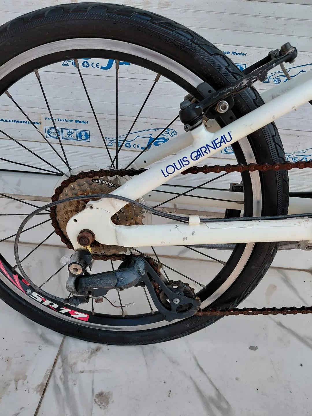 LOUIS GARNEAU FOLDING BIKE حجم 20 المنيوم بالكامل    ✈يوجد توصيل لجميع المحافضات ✈ كركوك مدخل سايدين حي الاسرى والمفقودين  معرض ابو شيفان ( *********** )
