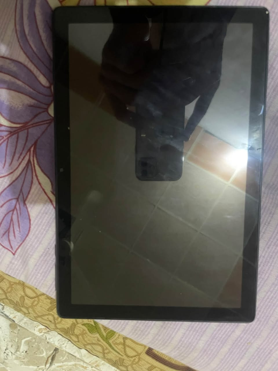 ايباد tcl للبيع ماعرف شنو مشكلته ذ٦٤
