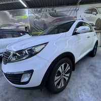 كيا سبورتج خليجي موديل ١٣ محرك ٢٠٠٠ ماشيه ١٠٠ الف  رقم بغداد باسمي شاش...