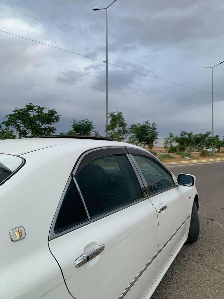 موديل ٢٠٠٥ • ٤ أبواب • فتحة سقف