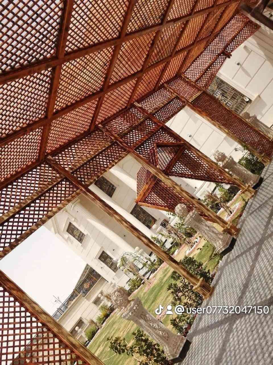 مستعدون لعمل المظلات الخشب وجلسات الاستراحه والمنازل الخشب الكوخ  للاستفسار ***********

نص مكتوب في الصور:
- @user***********