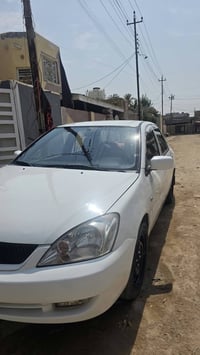 لانسر • ٢٠١١ • رقم بغداد