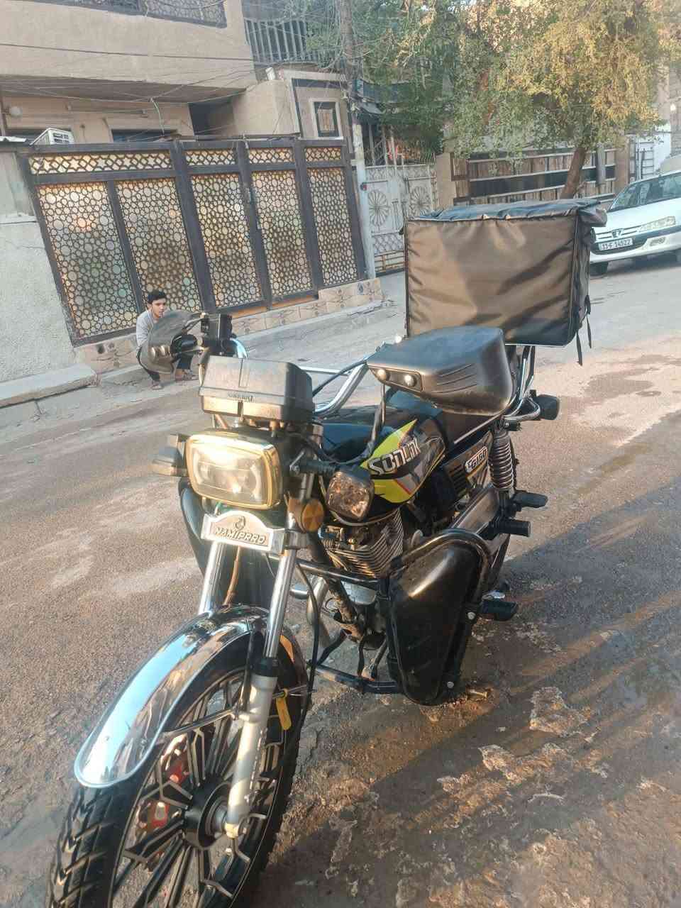 دراجه يراني سونك 5كير  2024 كامله مابيها اي نقص اويه صندوك دالفري السعار 650 الزعفرانية شارع الكهرباء الرقم ***********
