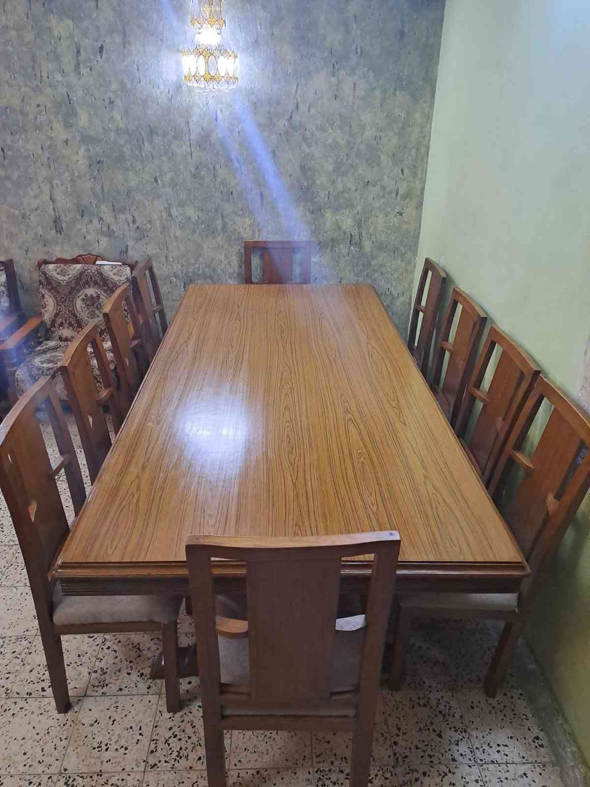ميز طعام ١٠ كراسي ملكي خشب صاج بورمي شغل عراقي بدون اي ضرر الاتصال ***********

