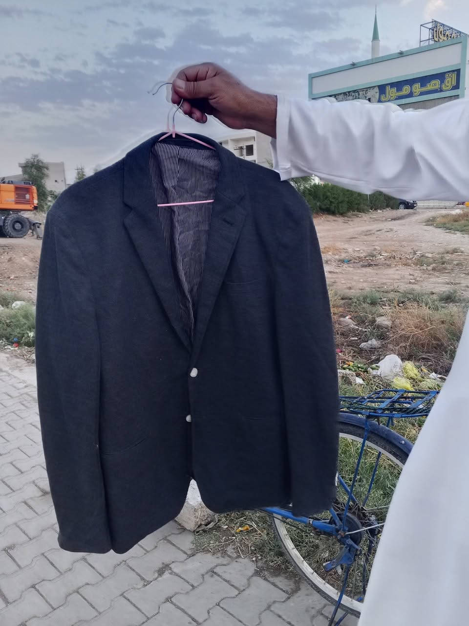 جاكيت رجالي • حي الزوراء • مقابل اقصومول