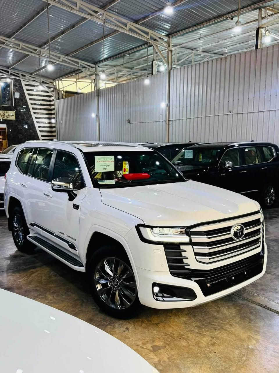 🔥👑 مجموعة الملك لتجارة السيارات الحديثة 👑🔥
عنوان الثقة • الفخامة • أفضل الأسعار

🚨متوفر جميع انواع الاندكروز 2026 + 2025 🚨

🔥 أسعار نار ودلال وحياكم الله وتدللون 
💵 البيع نقداً (كاش فقط)
📋 السعر شامل اللوحات المرورية – رقم بغداد

✨ أحدث إصدار TSS | فل مواصفات 1/1 ✨
           ✅ رادارات أمامية وخلفية ✅

🎁 ضمان ساس سنتين أو 40,000 كم 
🛢️ 8 تبديلات دهن مجانية🔧 8 فلاتر مجانية 
━━━━━━━━━━━━━━━━━━
🚗 قسم الزيرو 2026 

1️⃣ لاندكروزر GXR 1/1 (TSS) — أبيض 🤍

2️⃣ لاندكروزر GXR 1/1 (TSS) — أسود 🖤

3️⃣ لاندكروزر GXR Limited TSS Black Edition

4️⃣  لاندكروزر VX Limited BLACK EDITION TSS 

5️⃣ لاندكروزر VX Limited Twin Turbo TSS

6️⃣لاندكروزر  VXR HEV 2️⃣0️⃣2️⃣5️⃣
━━━━━━━━━━━━━━━━━━
🔥 أسعار VIP لا تُفوّت🚗 
السيارات جاهزة للتسليم الفوري⏳ الكمية محدودة...

📍 العنوان: بغداد – الكريعات – نهاية شارع المعارض

☎️***********

☎️***********

━━━━━━━━━━━━━━━━━━

👑 مجموعة الملك لتجارة السيارات الحديثةثقتكم رأس مالنا... ونوفر لكم أفضل المواصفات بأفضل الأسعار. أهلاً وسهلاً بكم.

نص مكتوب في الصور:
- TOYOTA LAND CRUISER 2025 | VXR HEV Hybrid | VXR ضمان تويوتا العراق ومرقم بغداد