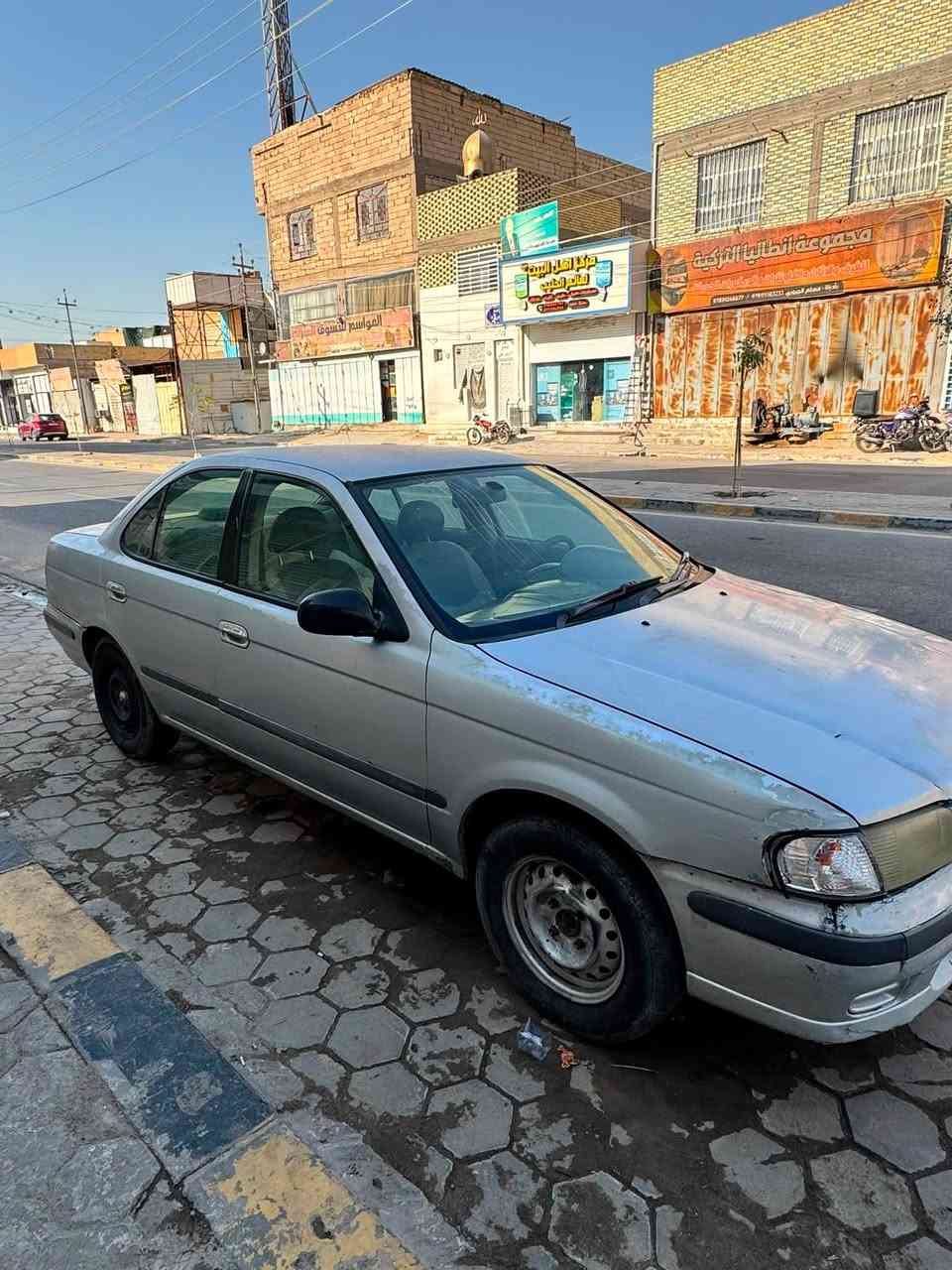 السلام عليكم
نيسان صني ياباني موديل 2000
السيارة معمرة و تبريدها ثلج 
مكاني نجف ، تجي تشوفها و تفحصها 
سنوية و كلشي جاهز سعرها 37 بيها مجال 
مكاني النجف الاشرف حي الجمعية 
***********
