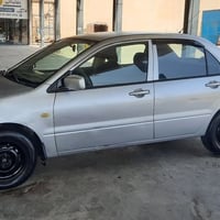 لانسر • ٢٠٠٩ • فحص جديد