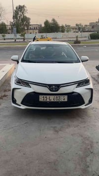 كورلا هايبرد ٢٠٢٣  ماشيه ٥٩ الف  داخل مشمشي  موصفات فول مال ٢٣  تايرت ...