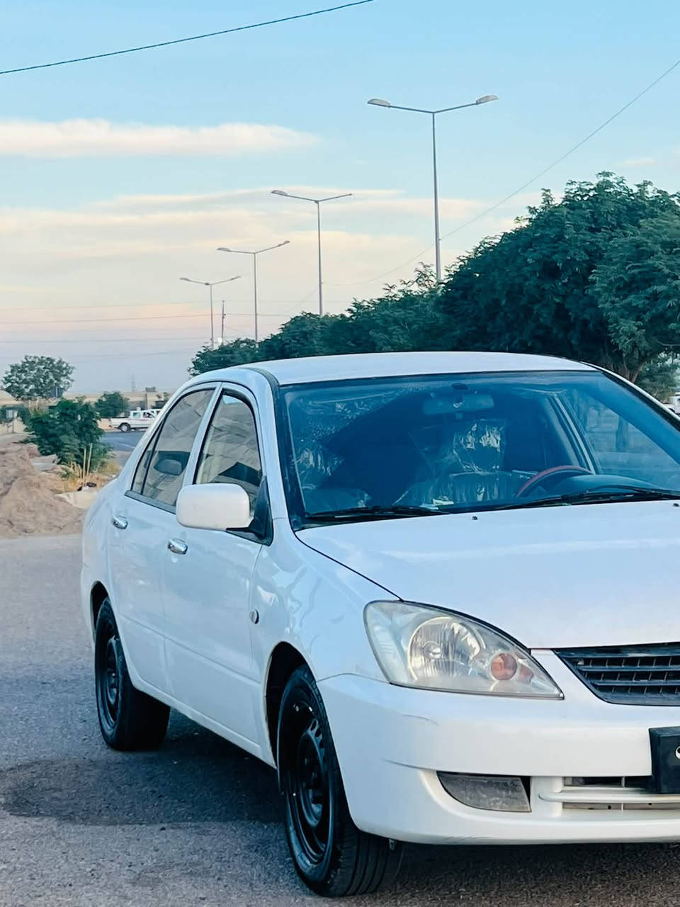 لانسر ٢٠١١ • اوتوماتيك • رقم بغداد