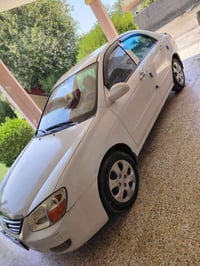 للبيع سيراتو 2009 رقم بغداد محرك 1600 محرك وكير حاويه تبريد شغال باقي ...