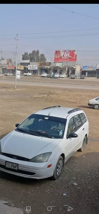 وبركاته للبيع في الموصل: سيارة فورد فوكس ٢٠٠٤ ستيشن  محرك نظيف هيكل قط...