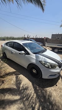 سيراتو 2014 مكفولة كفالة عامة بيهة بارد شوية بل باب سنوية لل ٣١ مكان و...