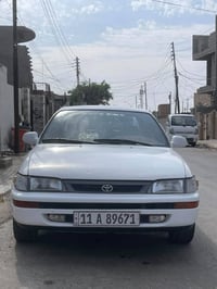 كورولا خليجية 97 بلاد يسرة  دبل ايرباك سيارة كفالة وجديدة حيل  بيها قط...
