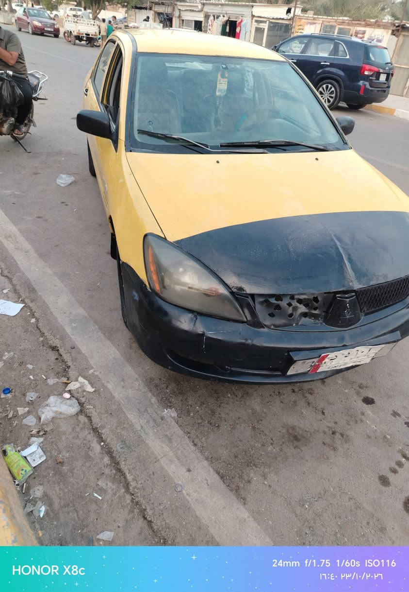 لانسر 2010 • باسمي • رقم ديالى