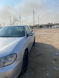 للبيع فقط نيسان سني ياباني  قبغ ابيض موديل 2010 ضرر خفيف بخشم الجامرلغ...