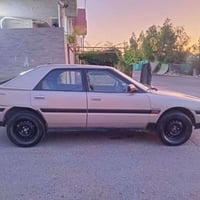 مازدا ٣٢٣ • موديل ١٩٩٢ • رقم كركوك