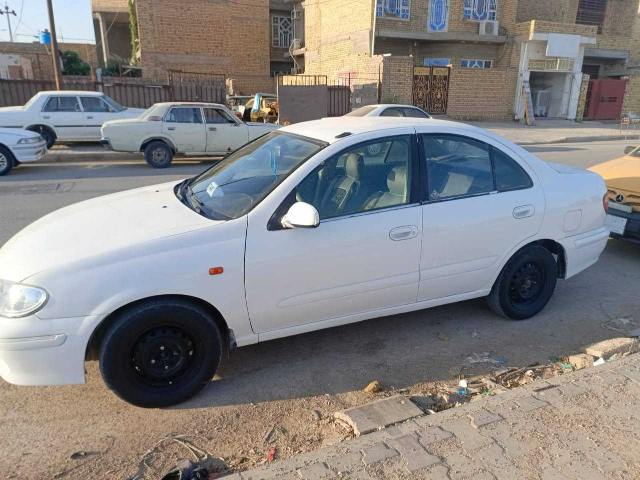 نيسان سني موديل 2001،مكينه جديده صارلي يومين شاده ،كير كفاله تخم تأير جديد مصبوغه حزام لجماليه باتري جديد تبريد شغال كهربائيات شغاله  السعر 63،وبيه مجال بصيط*********** العنوان الكوت شراي يتصل
