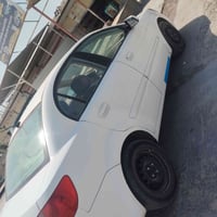 كيا ريو • ٢٠١١ • التاجي