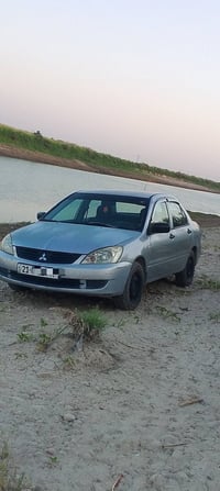 لانسر رقم سليمانيه جديد كير اوتماتيك مكينه 13 صبغ 3قطع تبريد ثلج 2009 ...